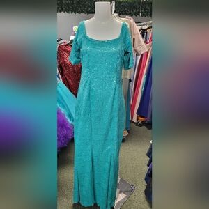 Unk Teal Blue Flutter Sleeve Scoop Neck Gown With Sparkle.